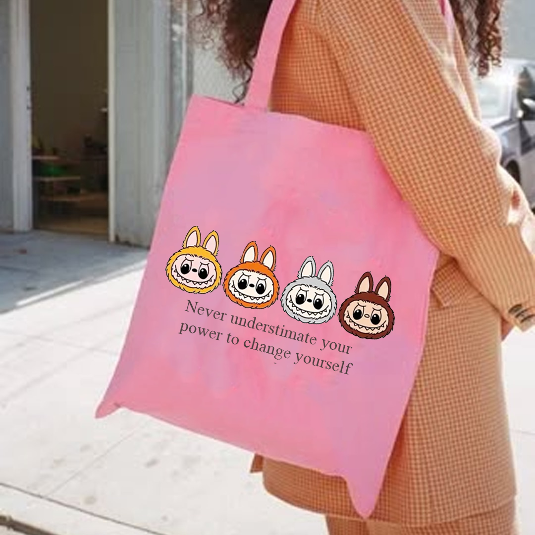 never understimate your power to change your self tote bag