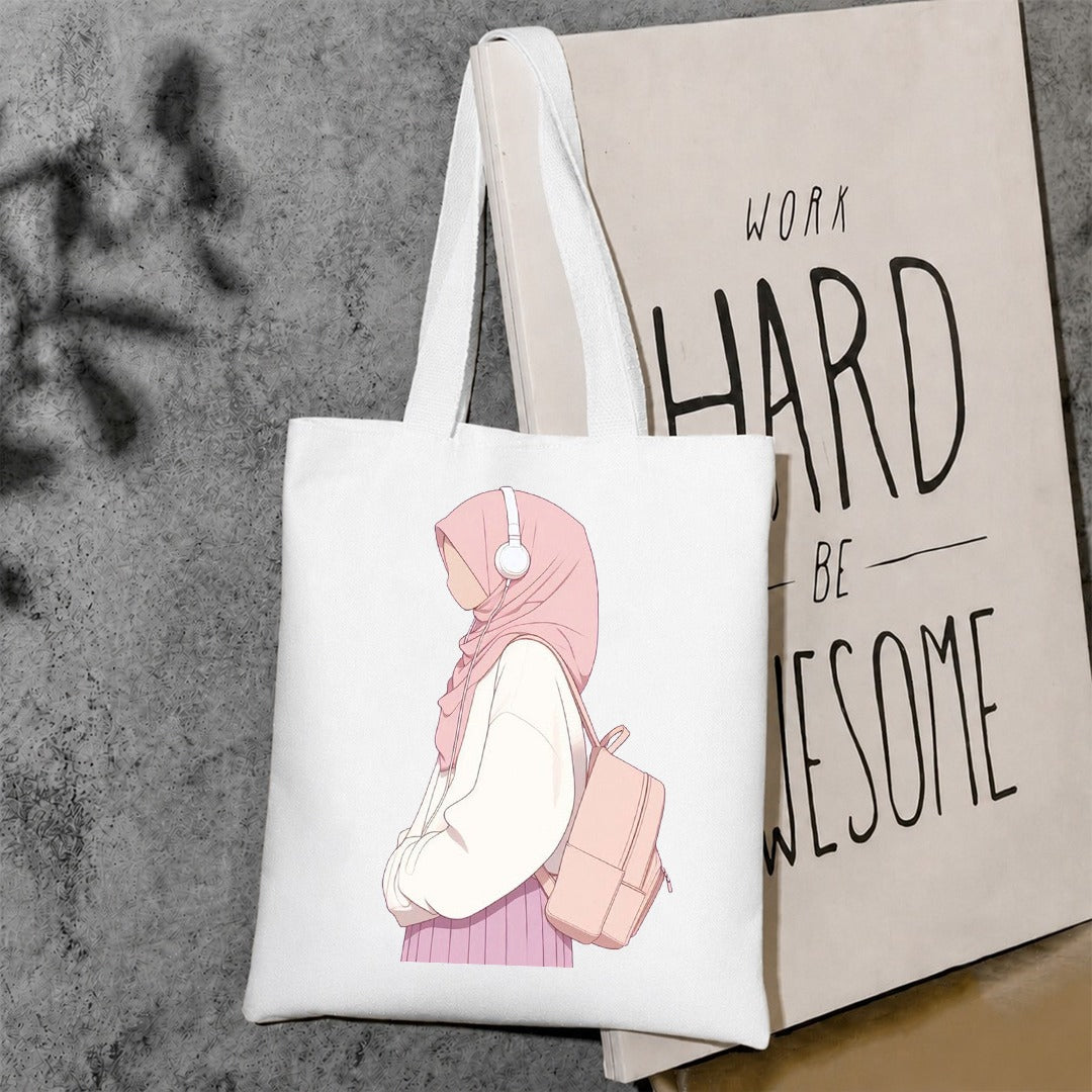 Pink hijab girl wearing headphones tote bag