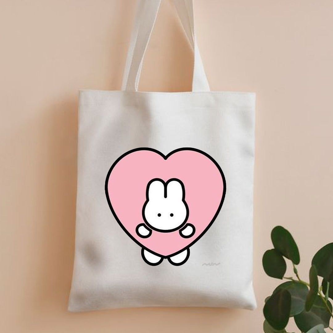 Rabbit in heart canvas tote bag