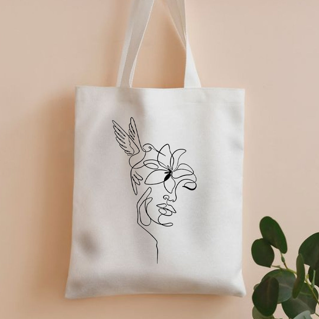 Line art bird face canvas tote bag