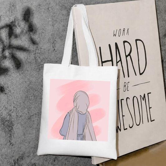 Pink background hijab girl tote bag