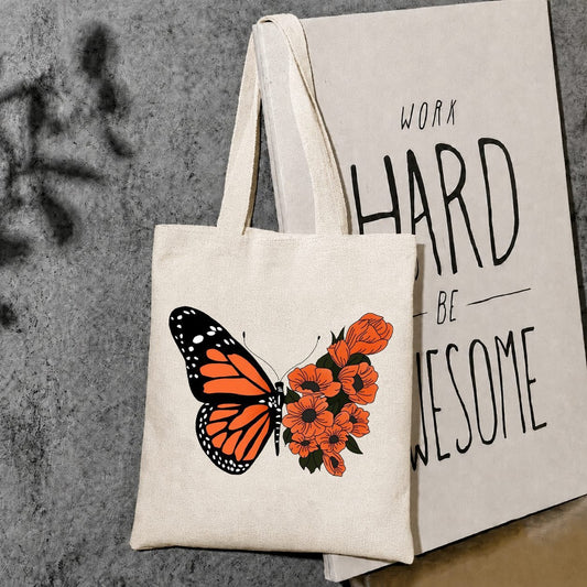 Orange butterfly canvas tote bag