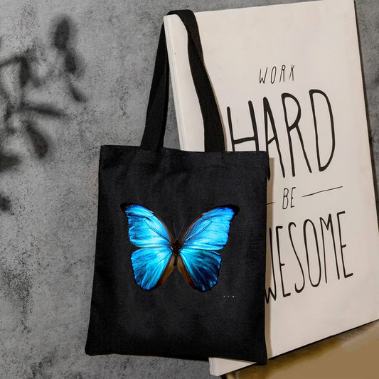 Blue butterfly canvas tote bag